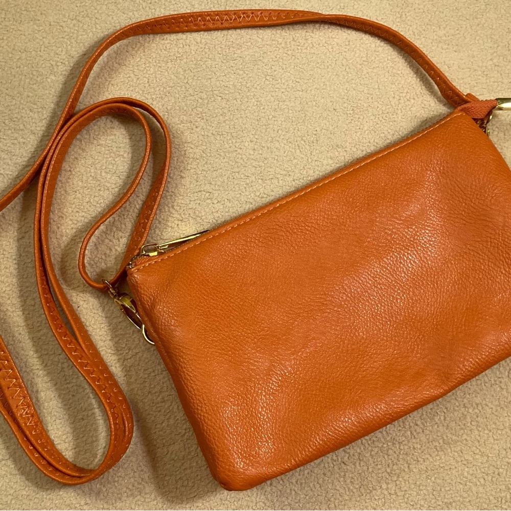 Persimmon orange supple textured leather casual bag with removable strap